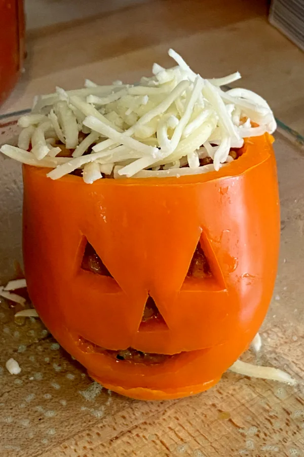 jack-o'-lantern stuffed peppers