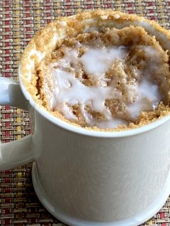 coffee mug cake with icing on top