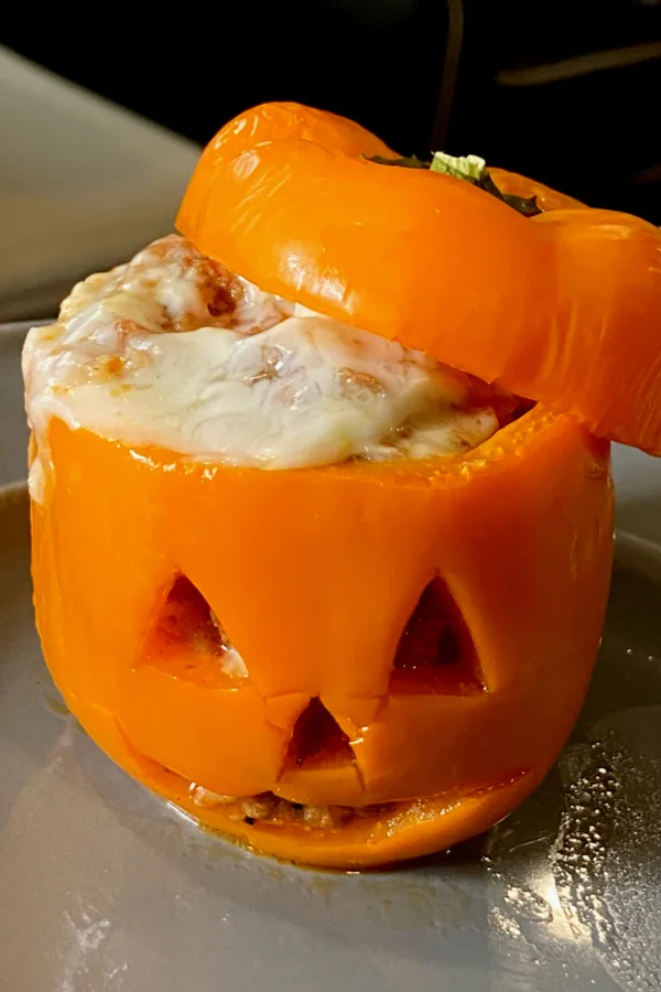 jack-o'-lantern stuffed peppers