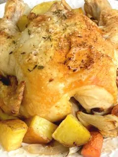 roasted Cornish game hen and vegetables