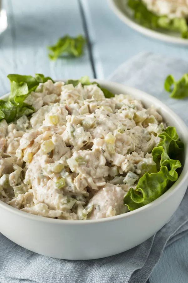 chicken salad in a bowl with lettuce