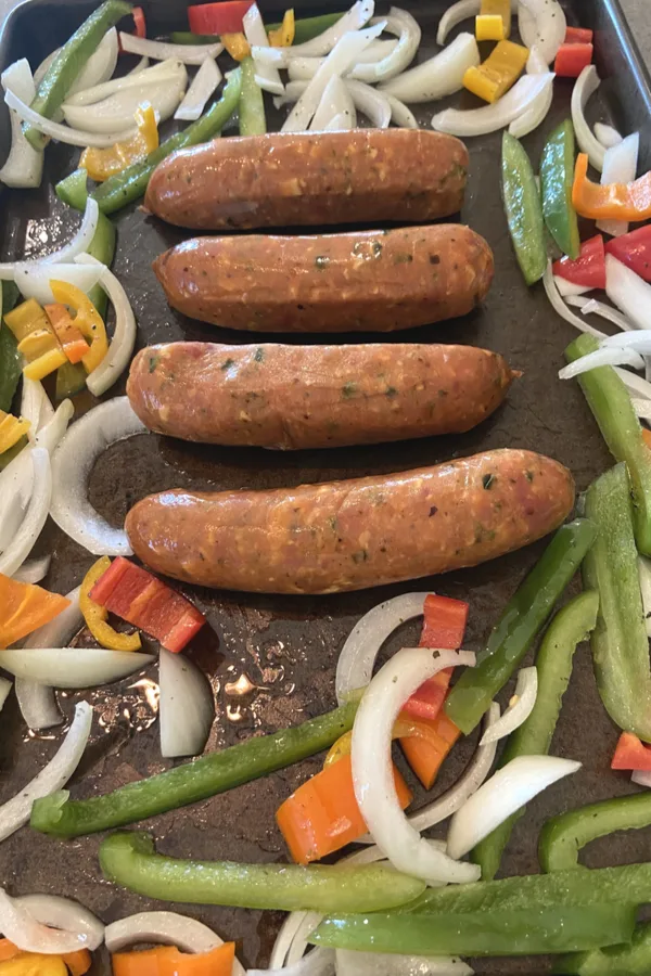 sausages on baking sheet