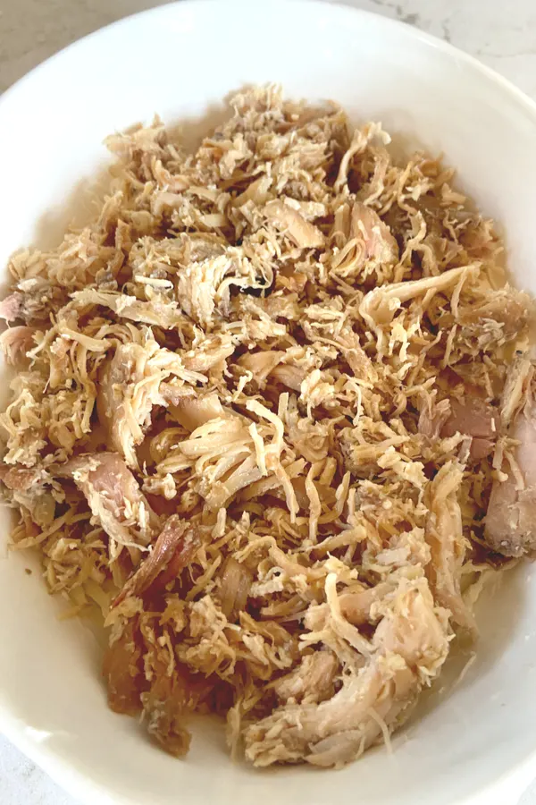 leftover rotisserie chicken in bowl 