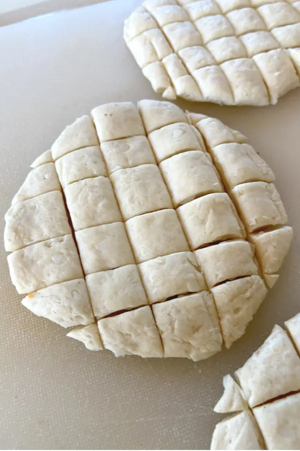 cutting biscuit dough 