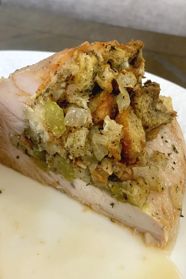 A serving of stuffed turkey breast tenderloin 