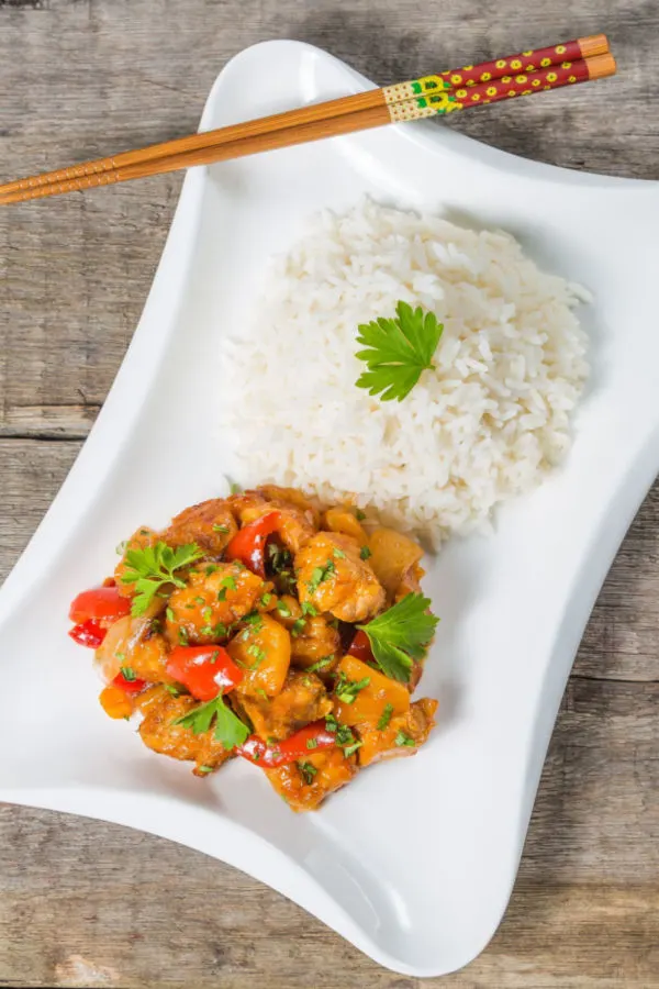 sweet and sour pork served with rice