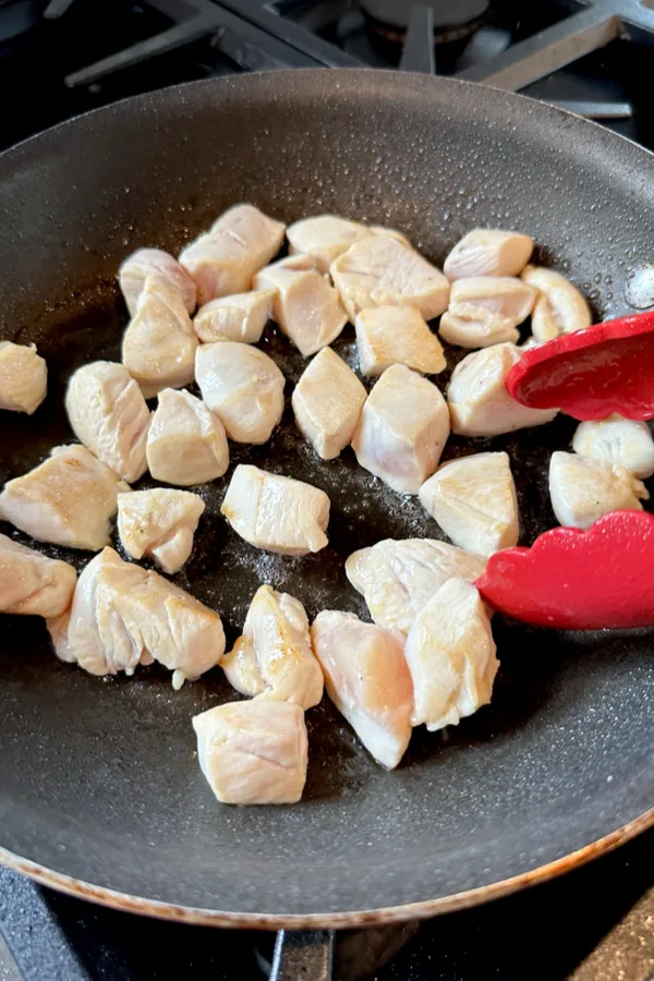 browning the chicken in the skillet