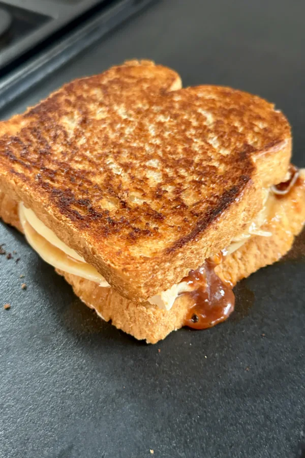 grilling a sandwich on griddle