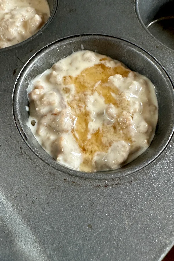 maple syrup on top of sausage pancake muffins