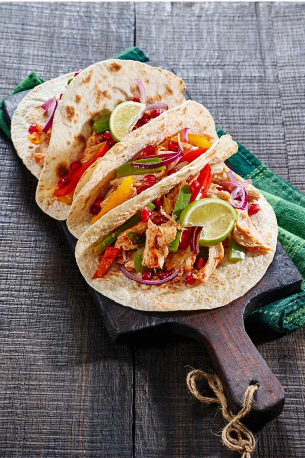chicken and saut&eacute;ed peppers in tortilla shell