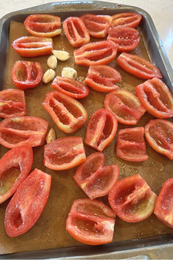 roma tomato halves and garlic