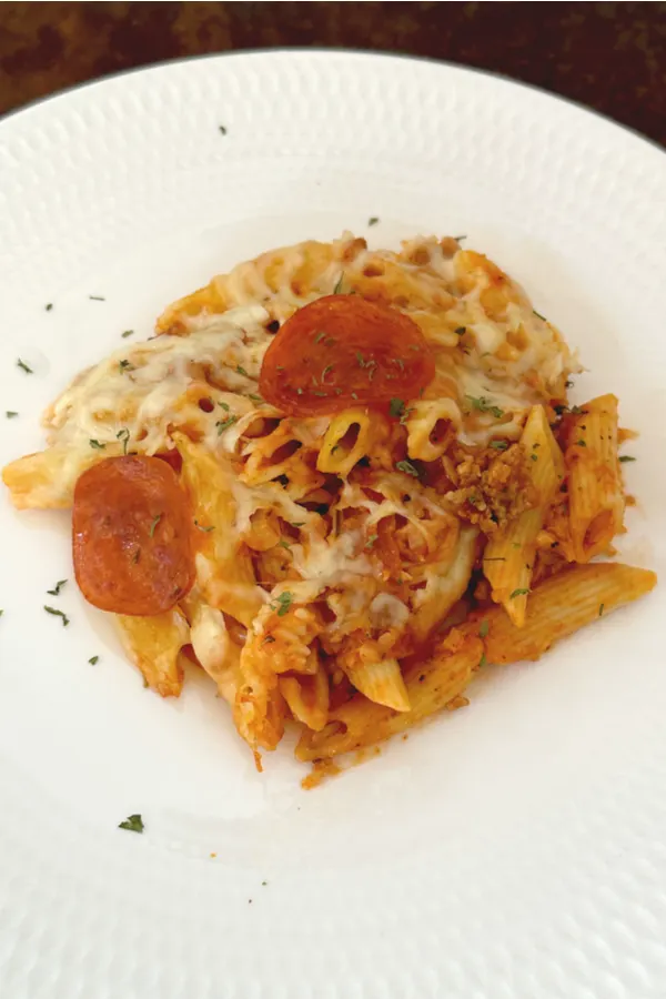 serving of pizza casserole topped with parsley flakes