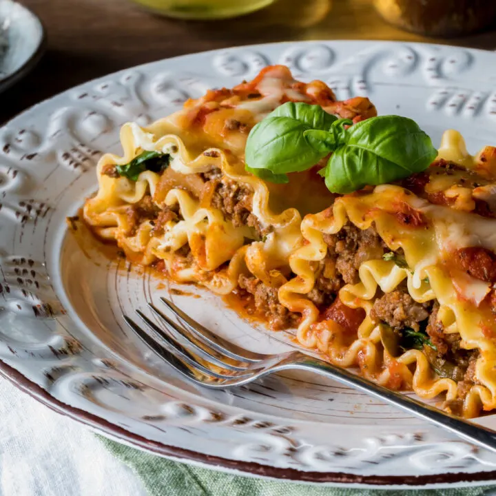 2 lasagna roll ups on a plate