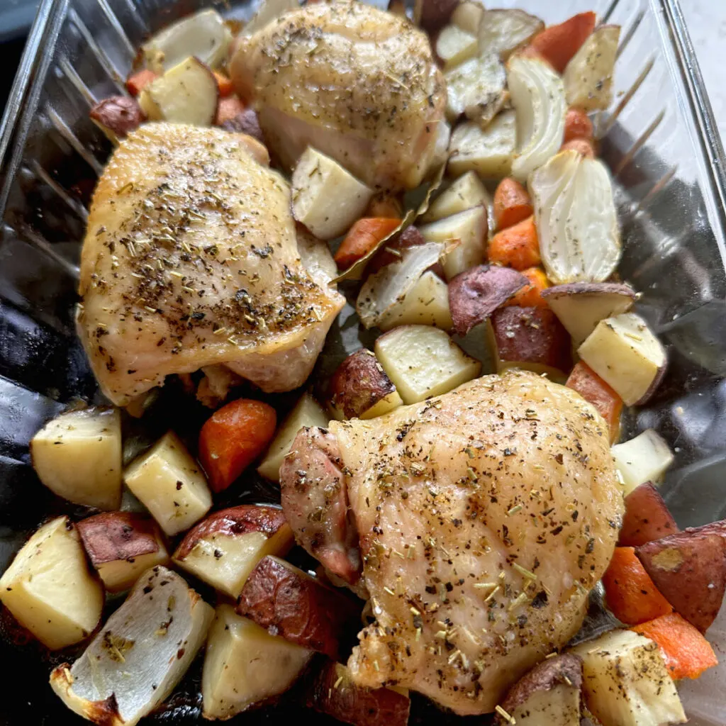 chicken thighs & potatoes dinner in baking dish