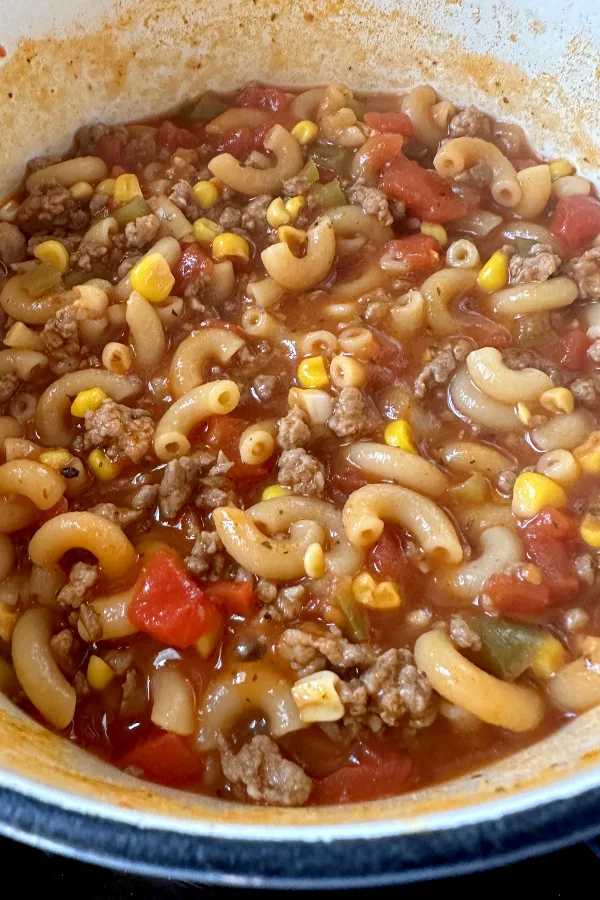 elbow pasta, ground beef, tomatoes, and corn.