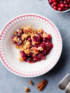 A bowl of cranberry apple crisp.