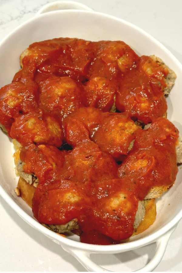 meatballs covered in marinara sauce
