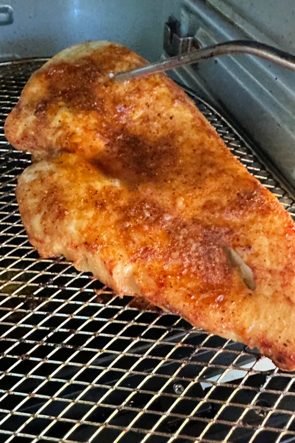 checking internal temperature of air fryer chicken breast