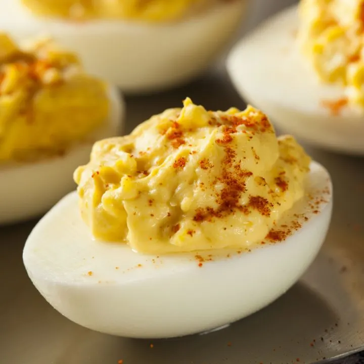 deviled egg with paprika sprinkled on top