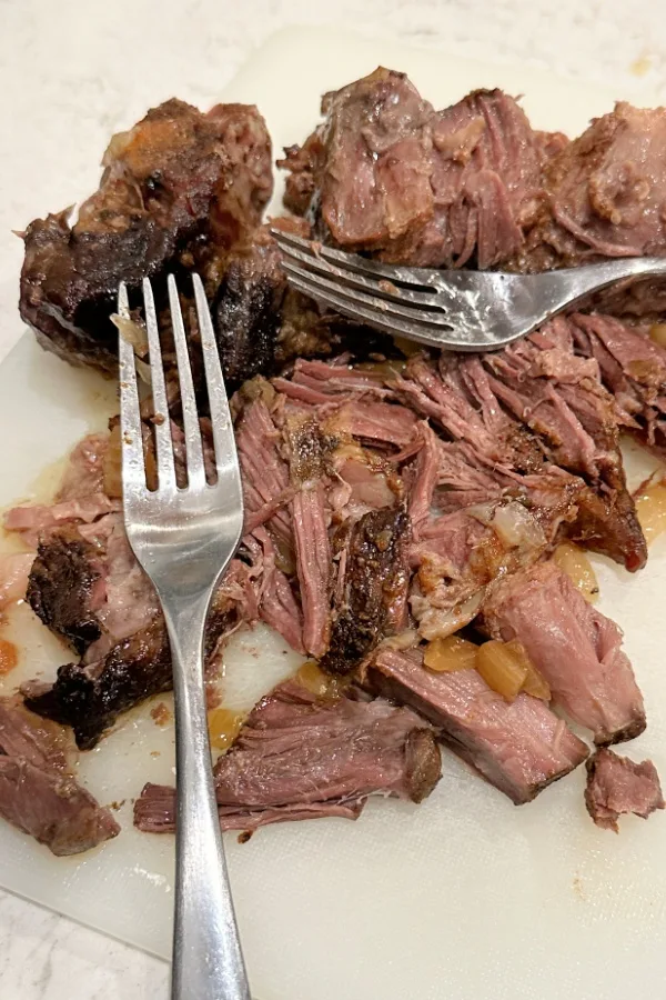 slow cooked shredded beef meat for enchilada