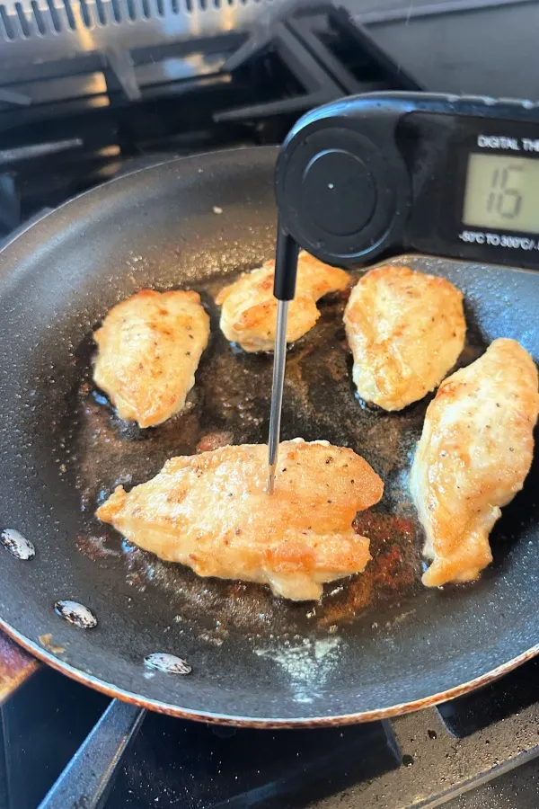 chicken cutlets in frying pan cooked
