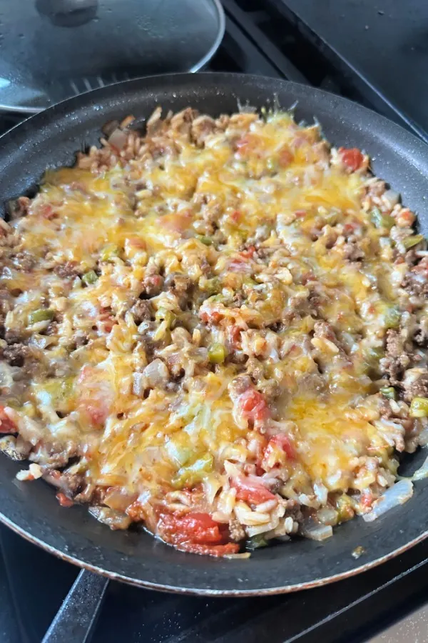 cheese on top of ground beef rice skillet dinner