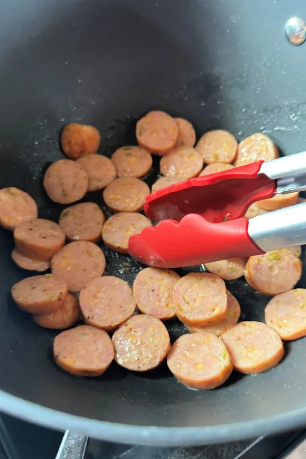 sliced sausage in skillet