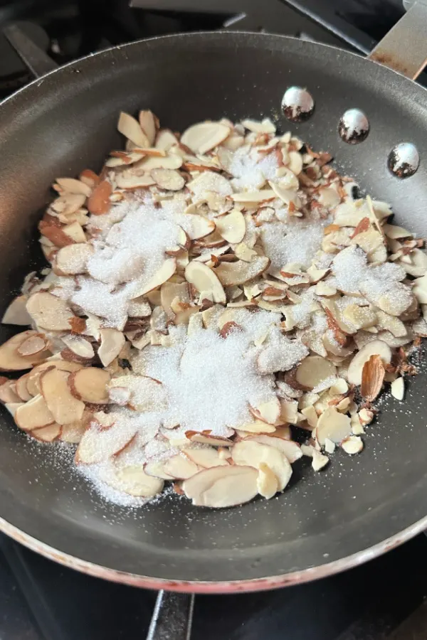 toasting almonds with sugar
