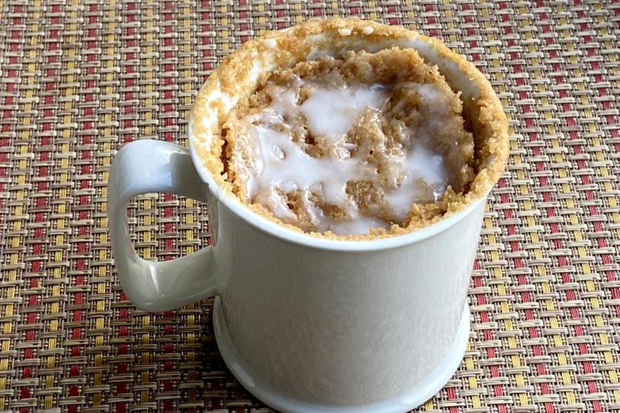 coffee mug cake with icing on top