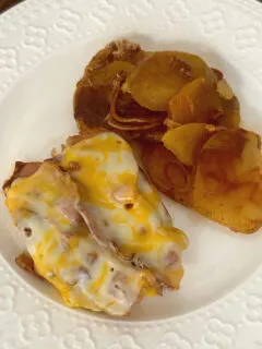crock pot barbecue pork chops and potatoes on plate