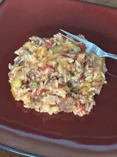 ground beef rice skillet dinner on red plate